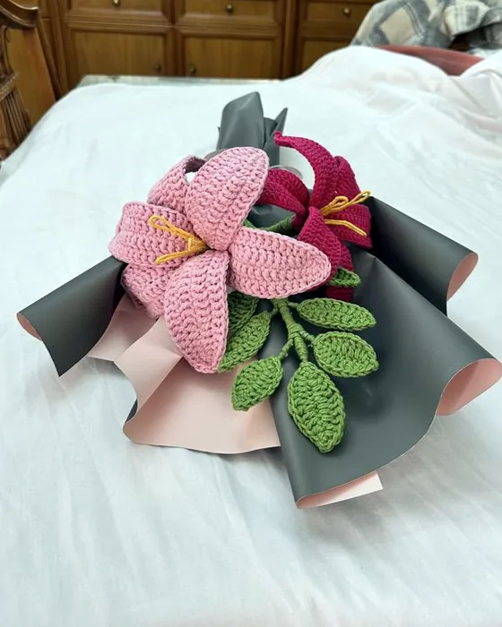 A bouquet of crocheted blush lilies