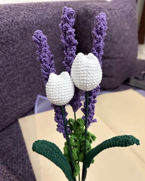 A bouquet of crocheted lavender and tulips